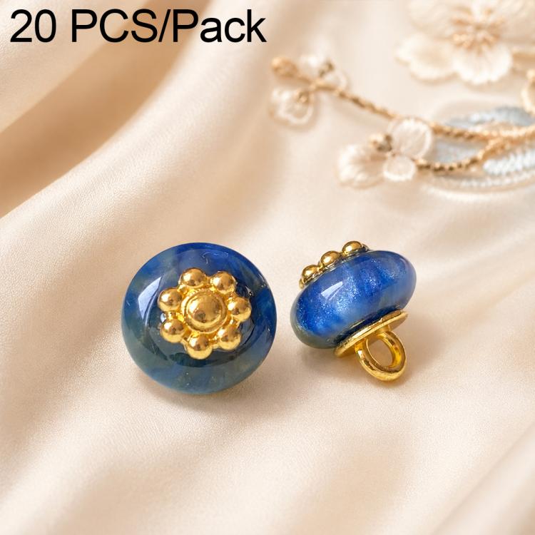 Blue resin floral shank button with gold flower top and gold rim, 1 piece view