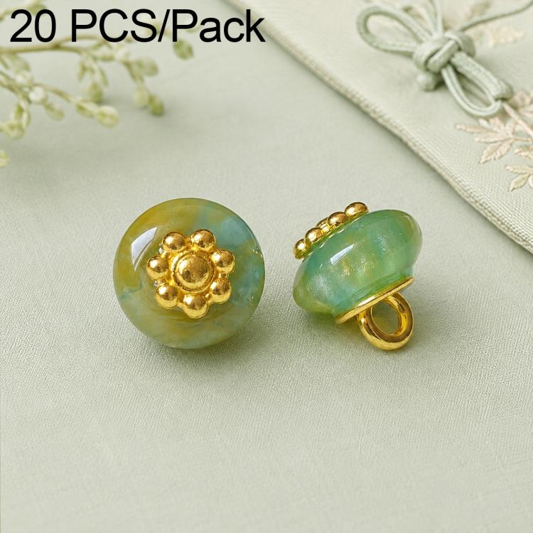 Mint green resin floral shank button with gold flower top and gold loop shank