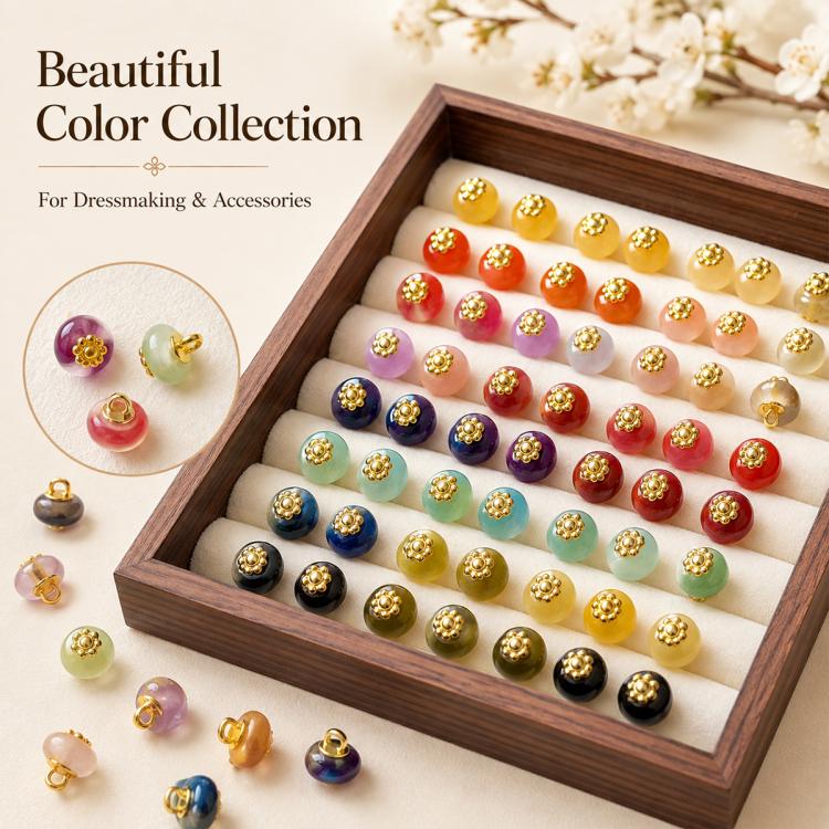 Assorted gold-flecked resin flower shank buttons displayed in a wooden tray