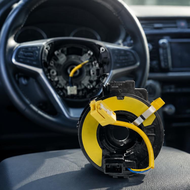 Car steering wheel clock spring airbag spiral cable, black housing with yellow wiring