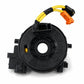 Steering wheel clock spring assembly, black circular housing with yellow cable and orange plug