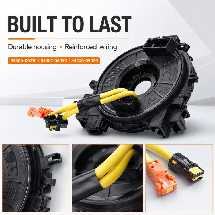 Clock spring spiral cable with black housing, yellow wiring, and orange connector at ends
