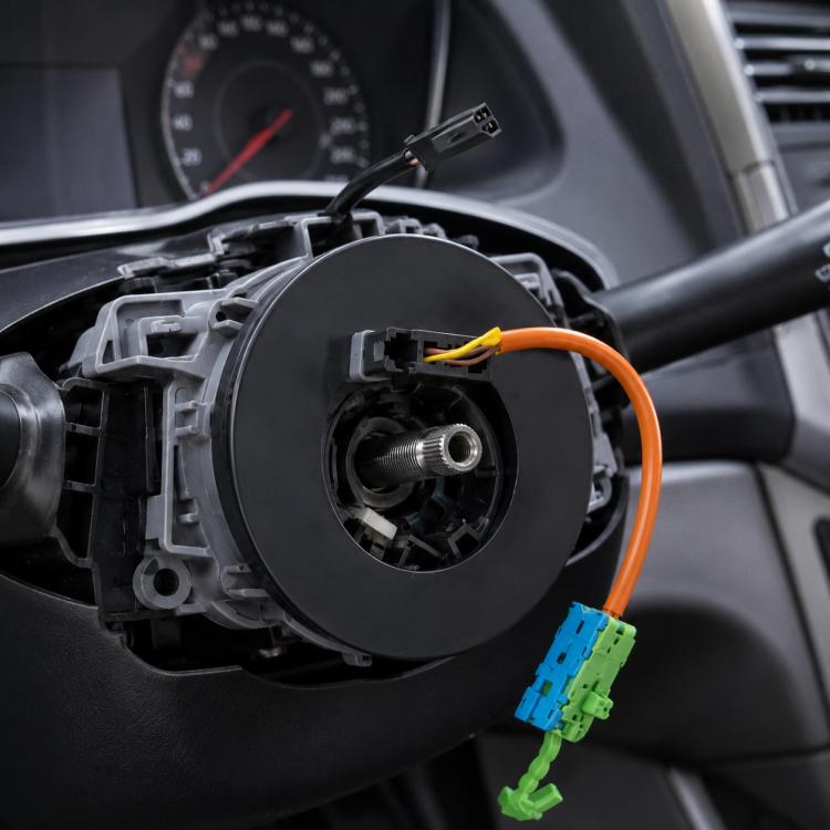 Car steering wheel airbag clock spring with orange cable and blue/green connectors