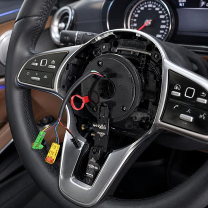 Mercedes-Benz steering wheel clock spring with black housing and colored connectors