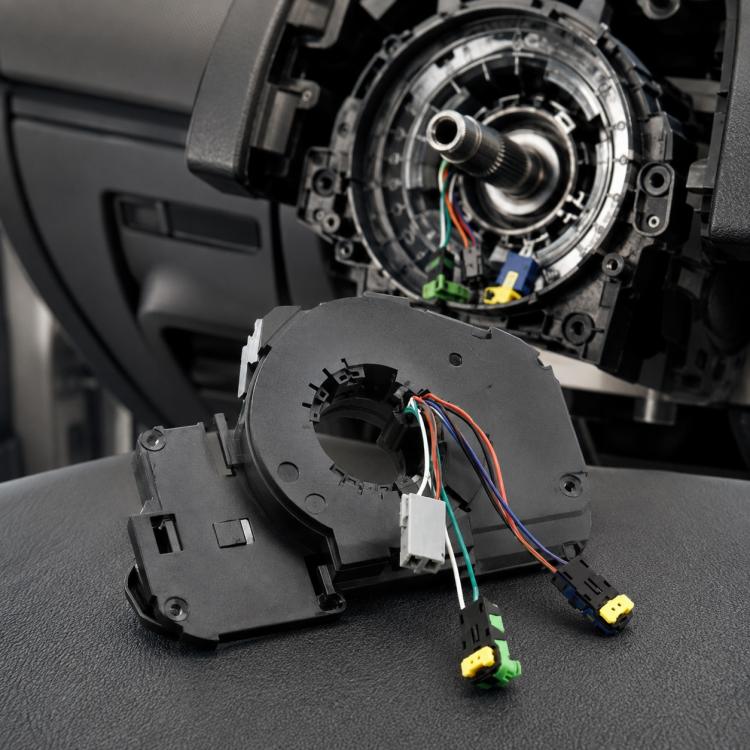 Spiral clock spring airbag cable module with multi-wire connectors, black housing