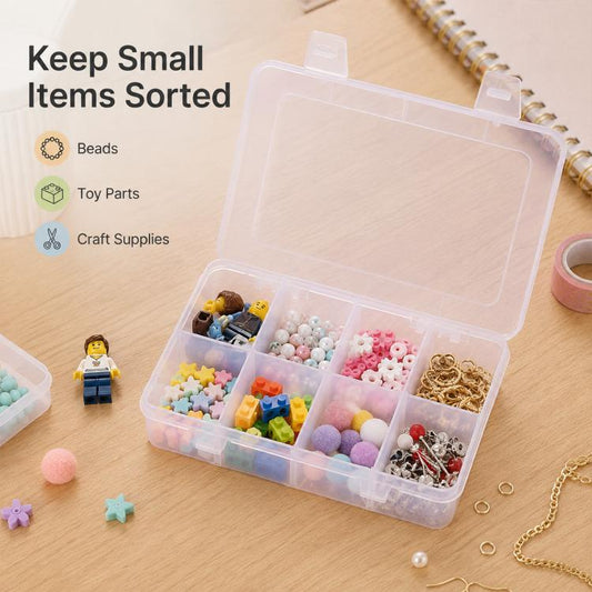 Transparent 8-compartment organizer box with dividers, filled with craft beads and parts.