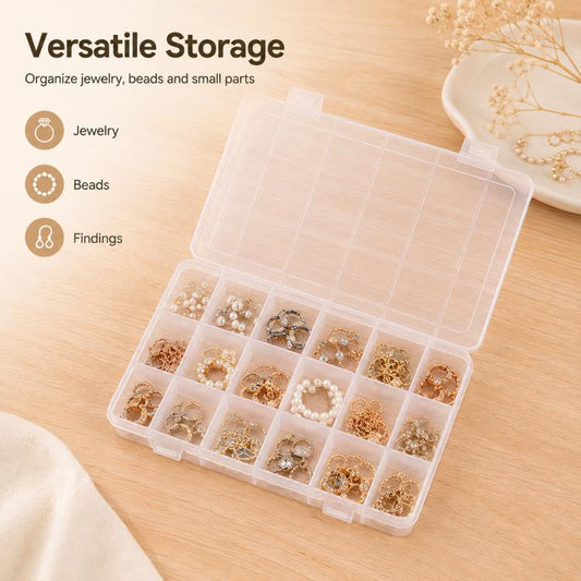 Clear compartment storage box with hinged lid, showing multiple small jewelry sections