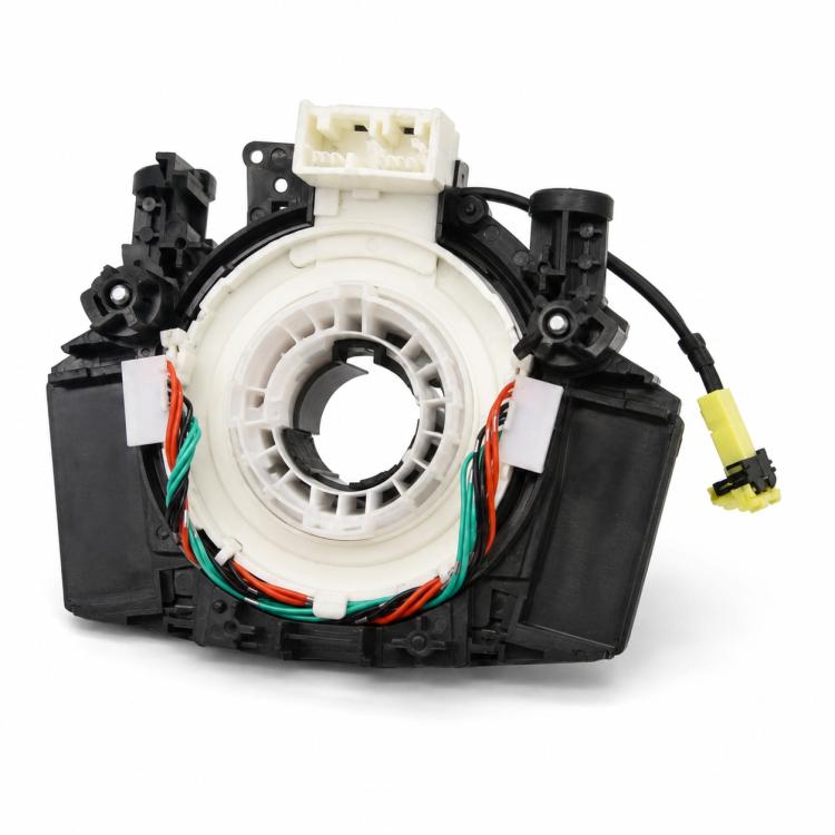 Steering wheel clock spring assembly with white spiral core, black housing, and wiring