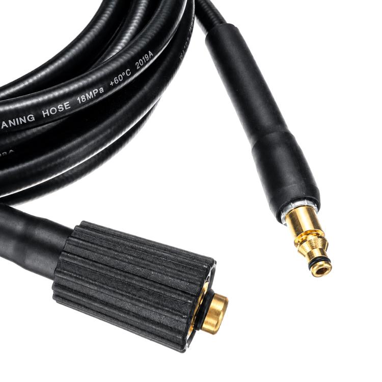 Close-up of black rubber pressure washer hose ends with brass connector fittings
