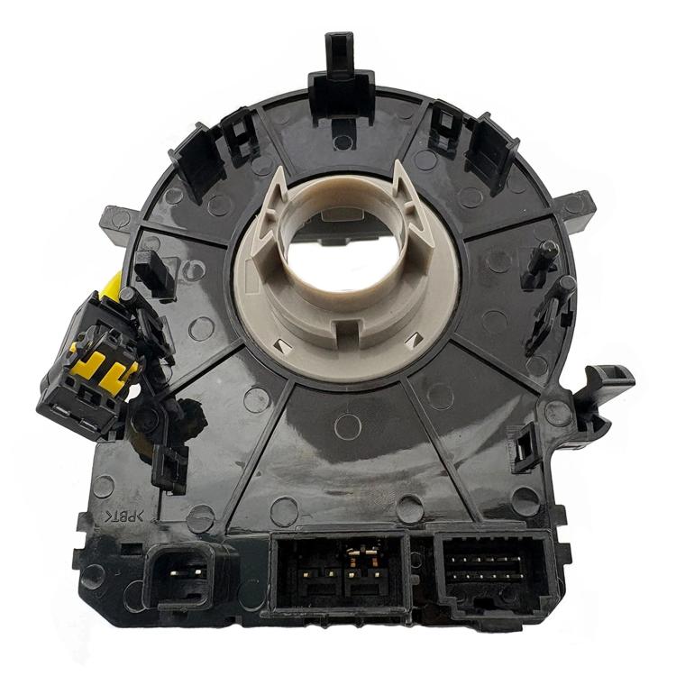 Steering wheel clock spring spiral cable underside with terminals and yellow wiring