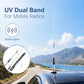 Long black-and-silver mobile radio antenna mounted on vehicle roof.