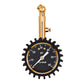 Brass metal tire pressure gauge with black dial, black gear-style protective cover