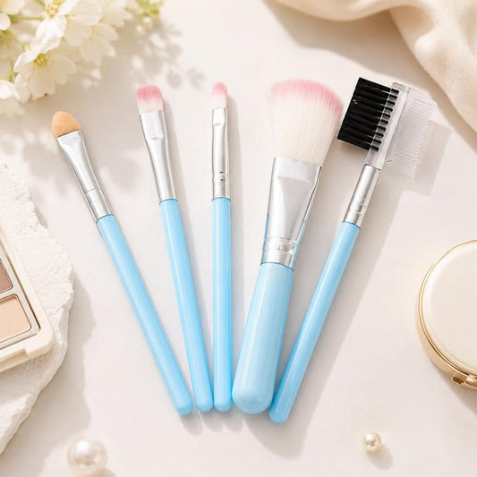 Blue makeup brush set with five brushes and soft bristles, silver ferrules