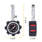 Compact tire pressure gauge with black rubber housing, metal stem, and red dial face