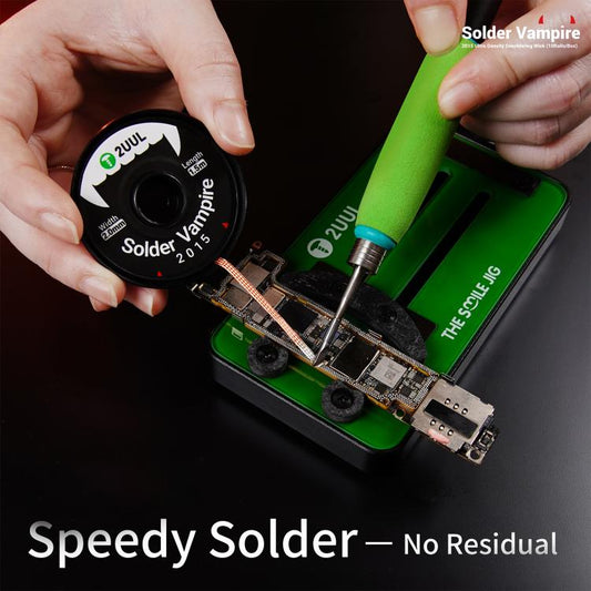 2UUL Solder Vampire desoldering wick spool and copper wick held over green circuit board