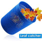 Blue pool leaf catcher with curved funnel holding autumn leaves