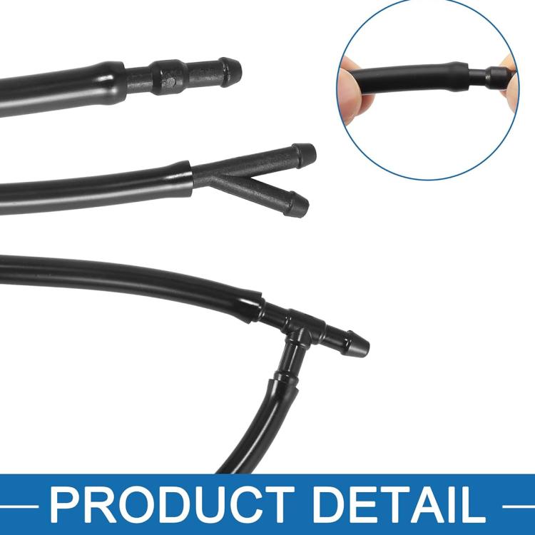 Close-up of black windshield washer hose nozzles and connector tees