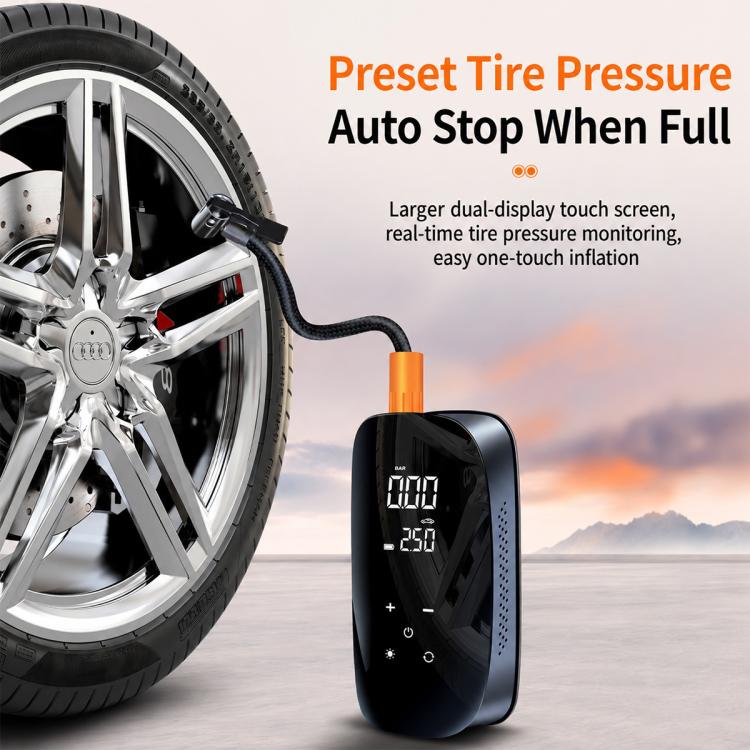 Black portable digital tire inflator with hose and digital pressure display near wheel