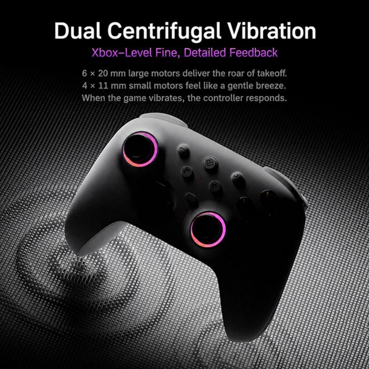 White and black wireless gamepad showing vibration motor detail with glowing rings