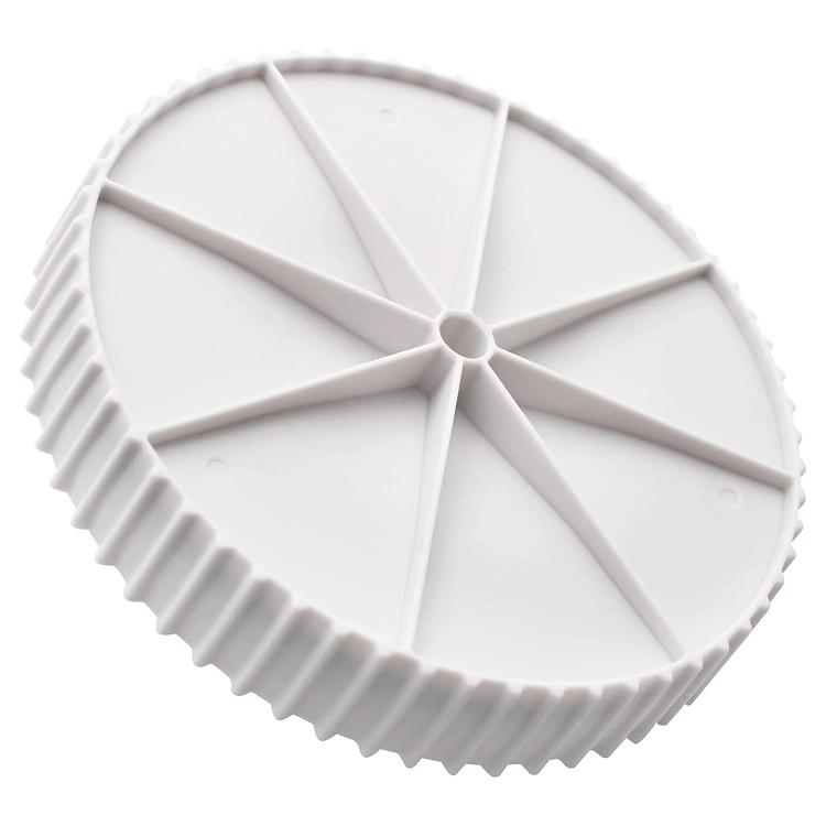 White circular pool drain cover with radial vanes and ribbed outer rim