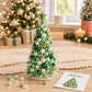 Beaded green holiday tree decoration with white pearls and green bead clusters