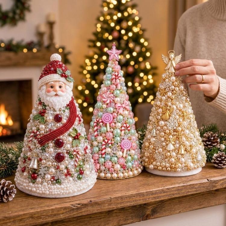 Three beaded Christmas tree craft decorations on display, red Santa, pink, and gold