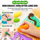 Pea-shaped crayons with rounded ends, hand coloring with an orange crayon
