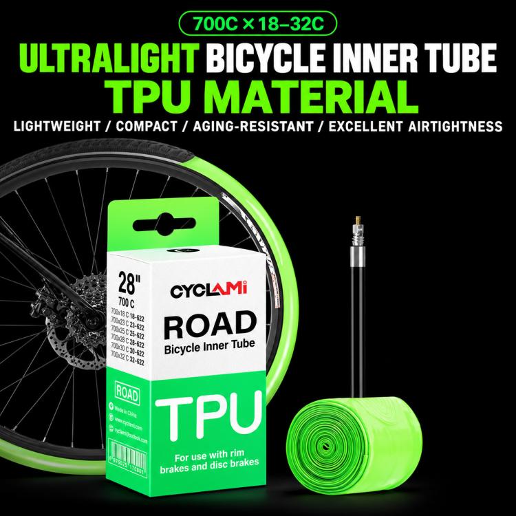 CYCLAMi TPU road bicycle inner tube, green coil with valve beside wheel