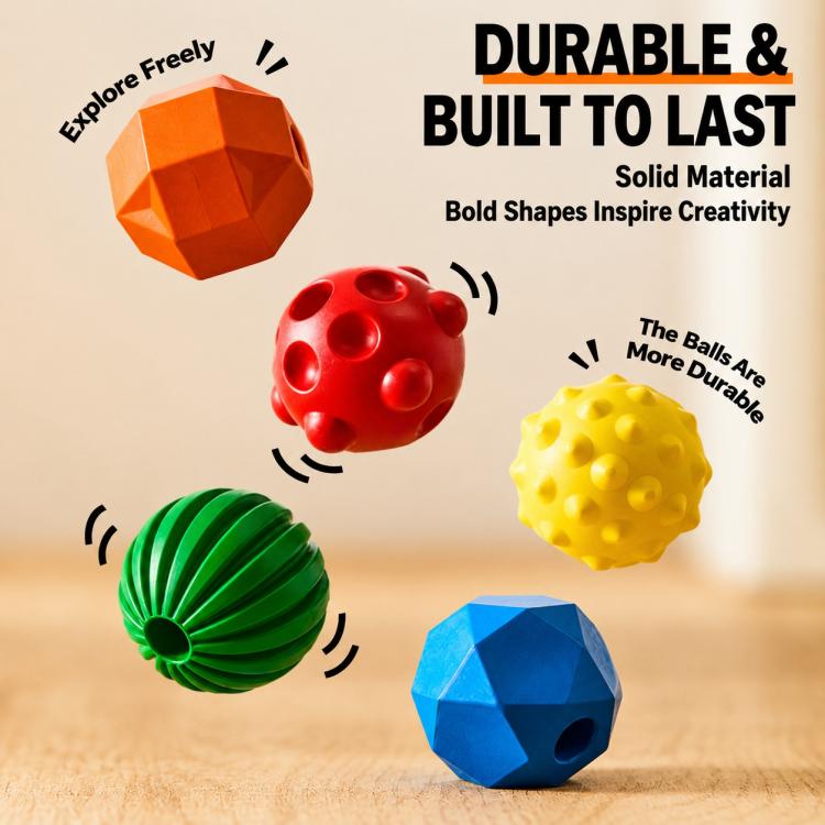 Durable tactile crayon balls in red, green, yellow, and blue with round molded textures