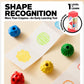 Shape-learning tactile crayons on paper: blue ring, green striped, yellow and red ball shapes