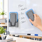 Grey magnetic spray board eraser with detachable washable pad, pressed to whiteboard