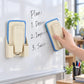 Beige magnetic spray board eraser with detachable washable pad, attached to board surface