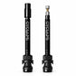 Pair of black Presta tubeless valve extenders with long aluminum stems and rubber bases