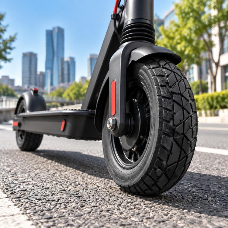 Off-road scooter tire with deep tread and tubeless design, angled view