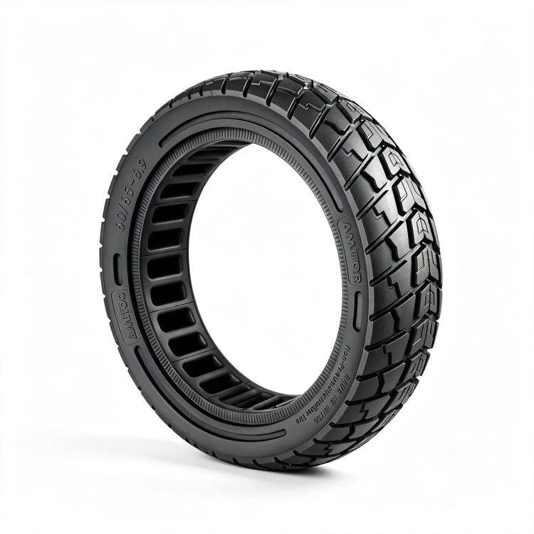 Black solid honeycomb scooter tire, studio view showing sidewall and tread.