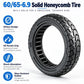 Black solid honeycomb scooter tire with chunky all-terrain tread.