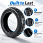 Black off-road vacuum tire with textured tread blocks and reinforced sidewall