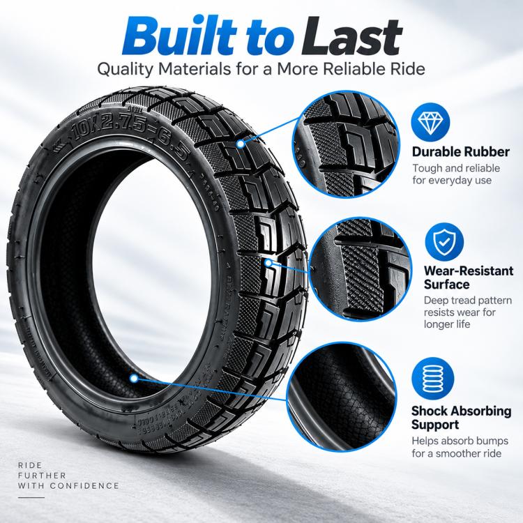 Black off-road vacuum tire with textured tread blocks and reinforced sidewall