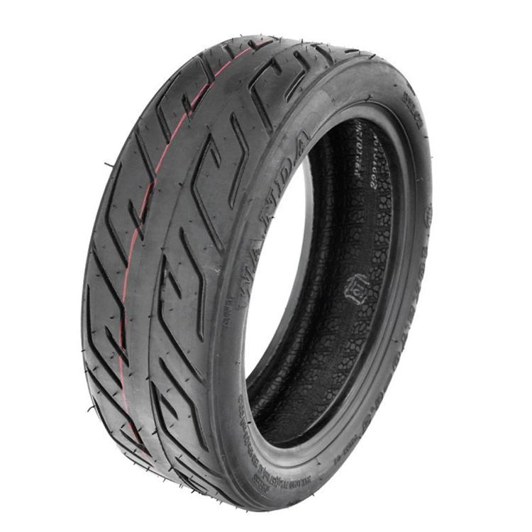 Black scooter tire with V-shaped tread and visible inner rim