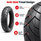 Black scooter tire with anti-skid tread grooves and smooth water-disperse channels