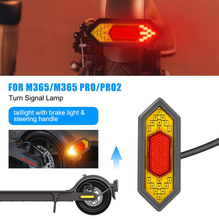 Rear turn signal and brake light showing red illuminated lens on scooter