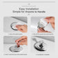 Silver flower toilet flush button pusher being installed on a toilet