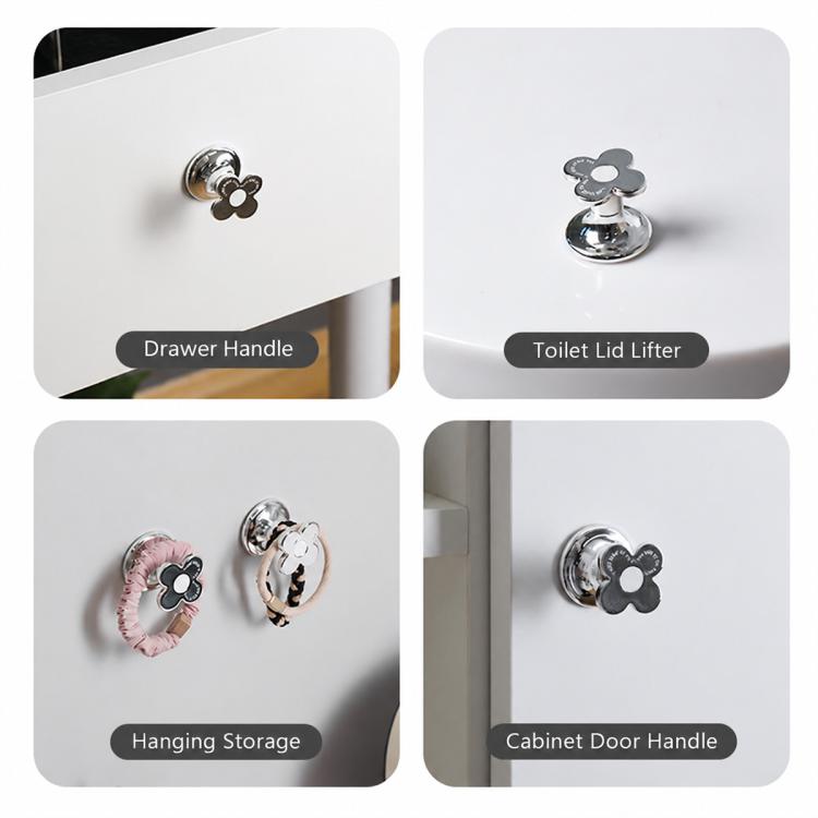 Flower-shaped silver knob-style pusher shown for toilet lid lifting and storage use