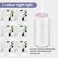 White mini car humidifier and air freshener with pink night light ring on top