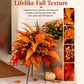 Orange-red fall floral garden stake arrangement with layered fern leaves and berry clusters