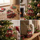 Layered fabric Christmas tree ornament made from fabric layers and buttons on display