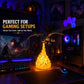 Black dragon night light with yellow flames, on desk setup with gaming keyboard and mouse.