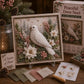 3D fabric poke art kit with framed dove figure among winter flowers