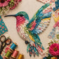 3D patchwork hummingbird applique, teal and pink layered wings with floral pattern