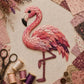 Layered patchwork pink flamingo-style bird with black beak and long legs